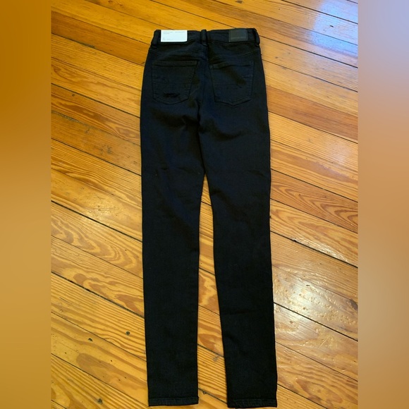 NWT! American Eagle Super Hi-Rise Distressed Denim Jegging 
Black Size 0 - Picture 5 of 13